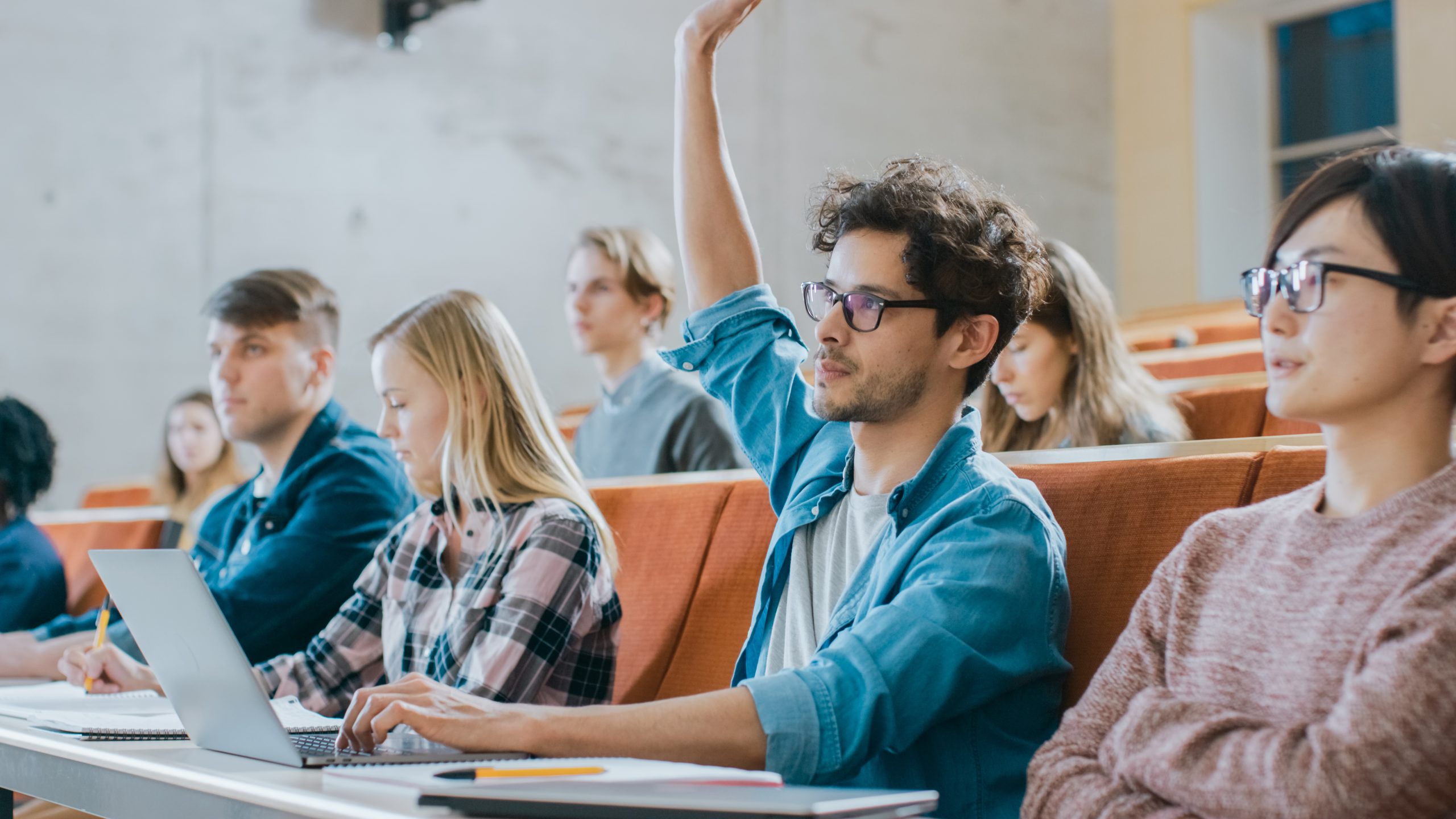 a student raising his hand